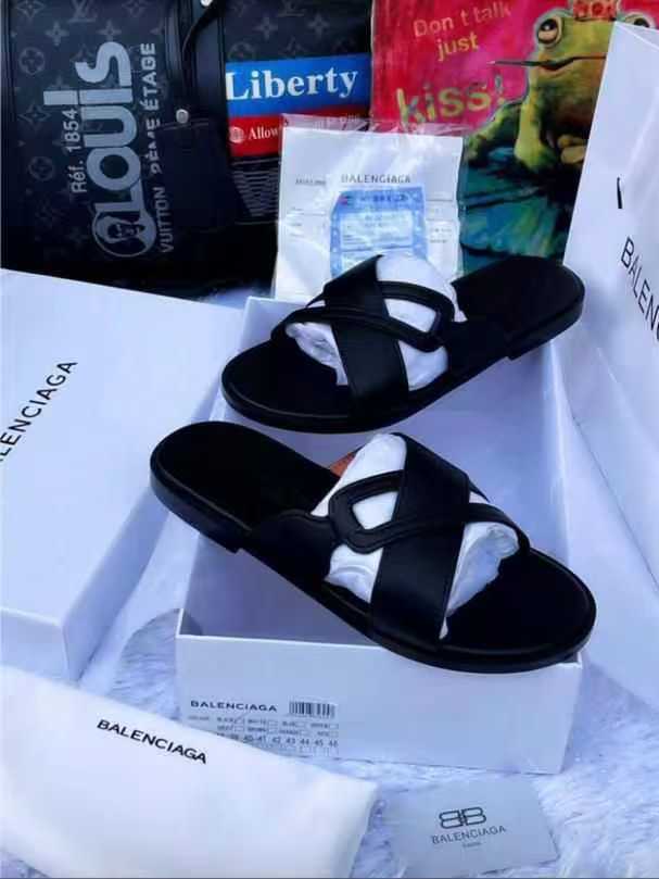 Women's Luxury BB Logo Cut Out Flat Slide Sandals Open Toe Slip On Designer Summer Shoes Black  ---  Minimalist flat slide sandals featuring interlocking BB logo-inspired cut-out leather straps across the upper. Smooth black leather construction with a sleek low-profile sole. Slip-on style with an open toe design. The clean geometric strap detailing delivers a bold luxury streetwear aesthetic perfect for summer outings, vacations, or elevated casual styling.