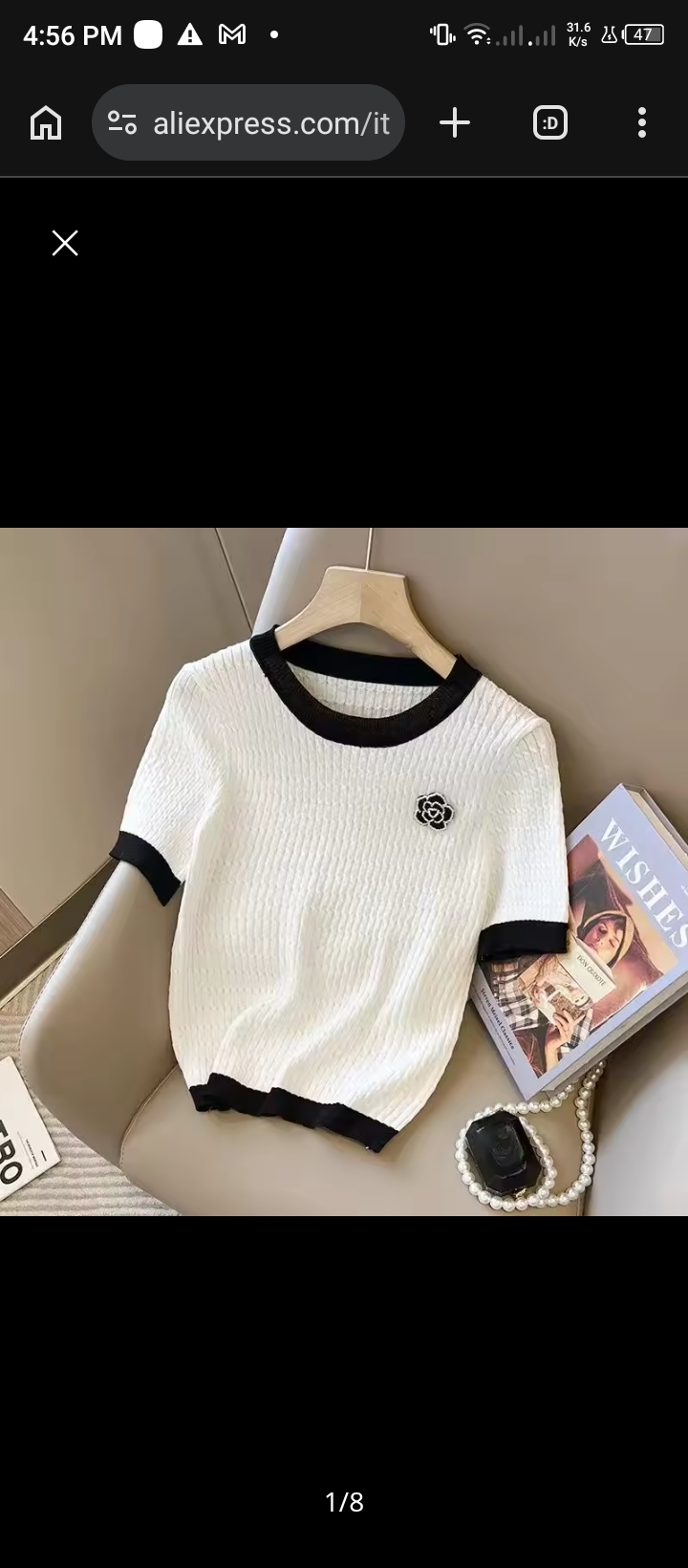 Elegant Contrast-Trim Knit Tee with Floral Embellishment 2