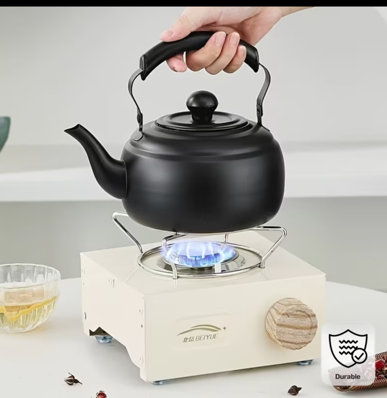 BEIYUE Matte Black Stainless Steel Whistling Tea Kettle on Portable Gas Stove