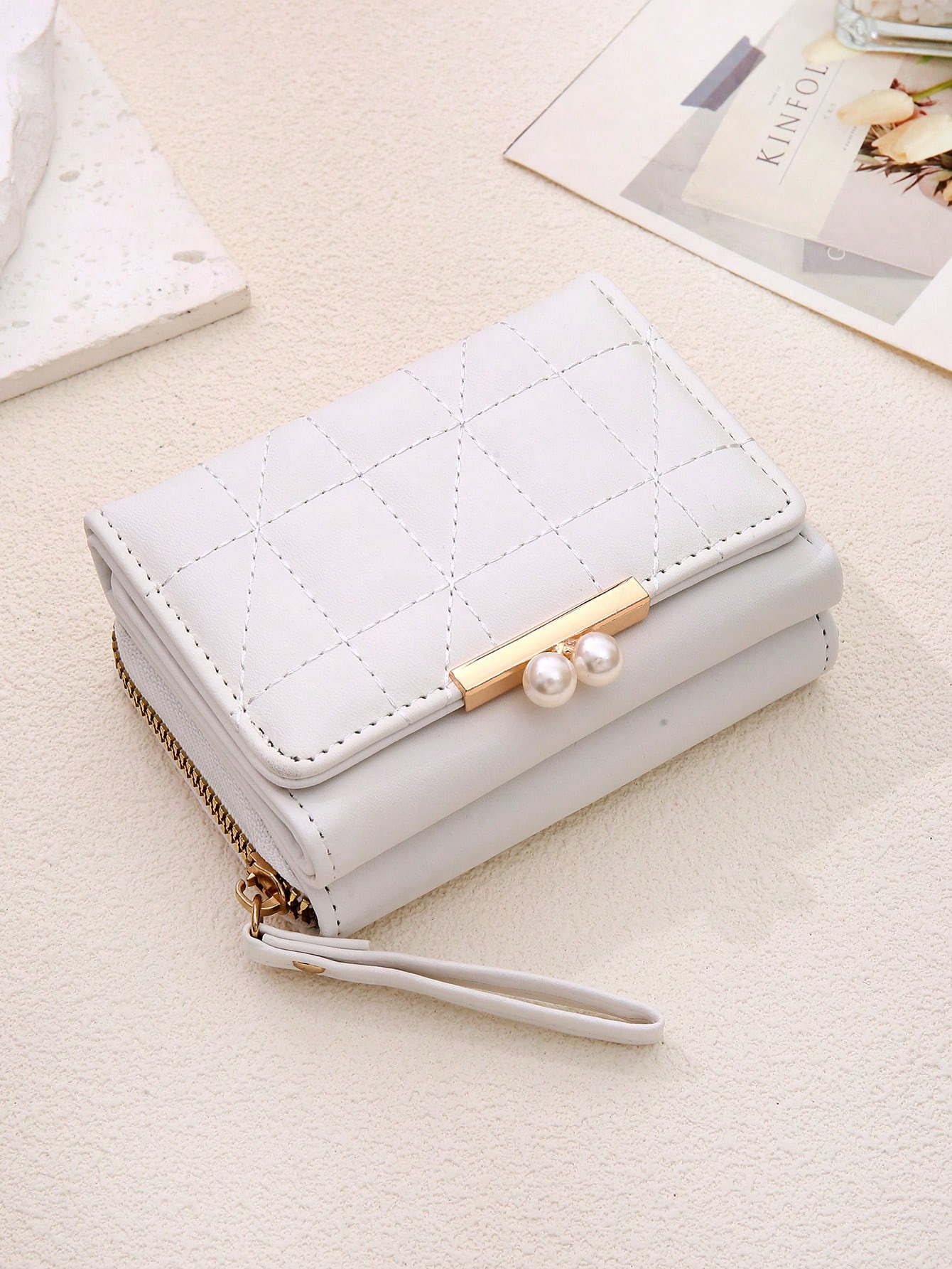 Elegant White Diamond-Quilted Bifold Wallet with Pearl Clasp