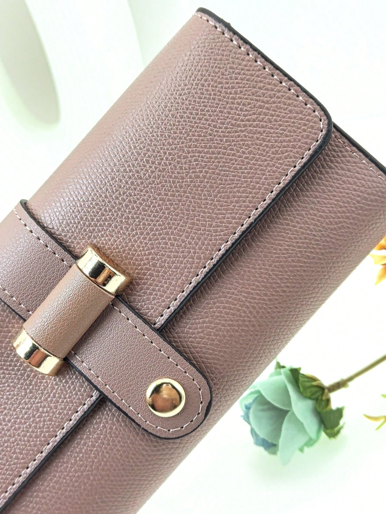Textured Buckle-Strap Continental Wallet