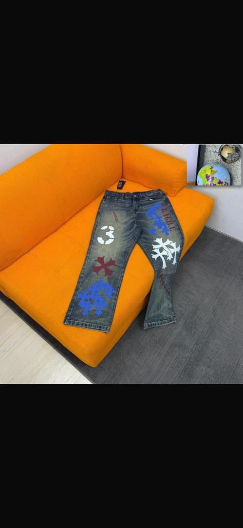 Vintage Wash Multi-Graphic Streetwear Jeans with Colorful Cross and Typography Patches