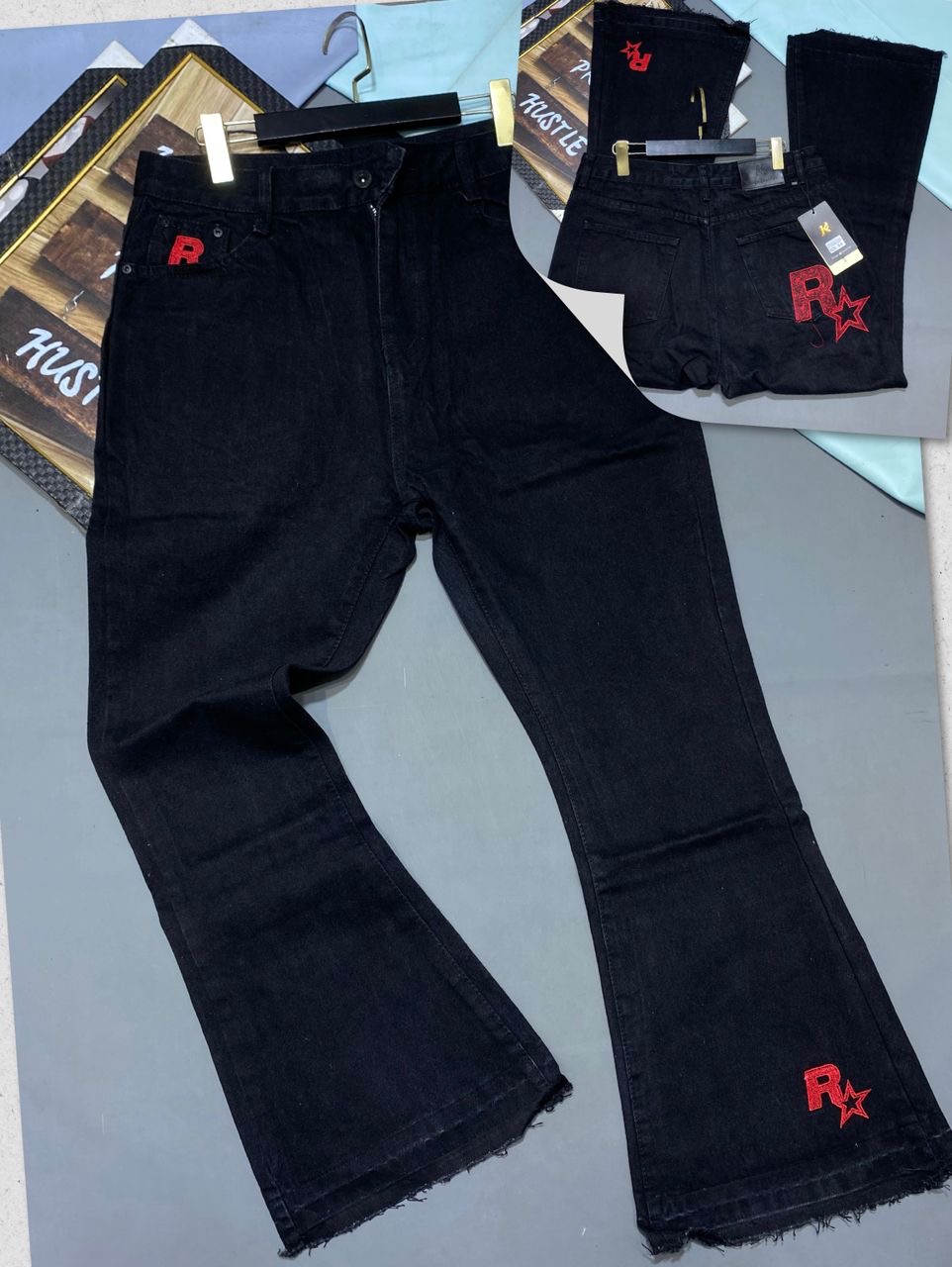 Frayed-Hem Washed Black Flare Jeans with Red Star-and-Initial Embroidery