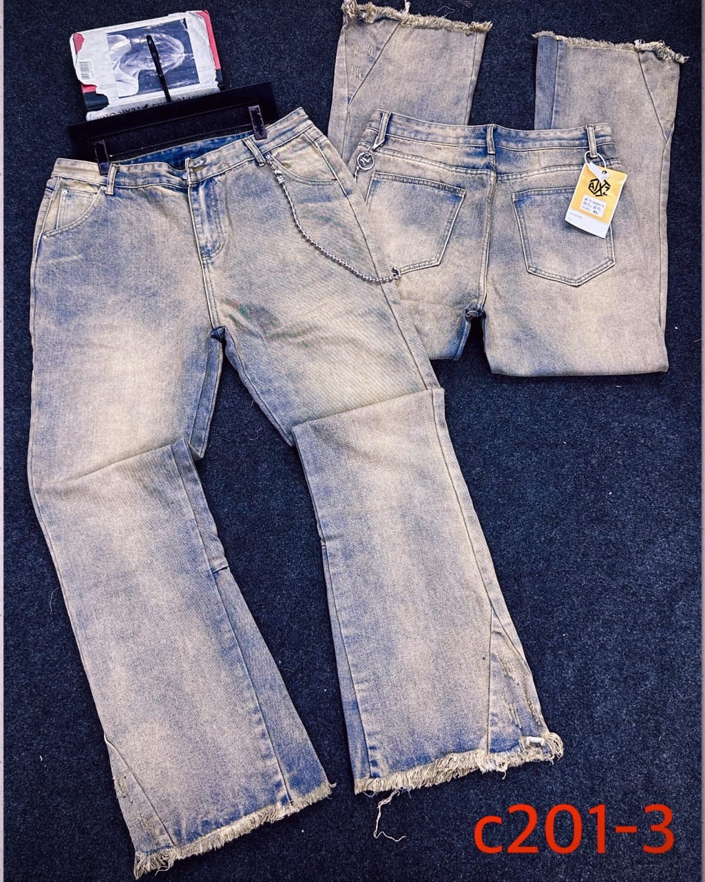 Sandwashed Light-Blue Flare Jeans with Frayed Hems and Fine Waist Chain