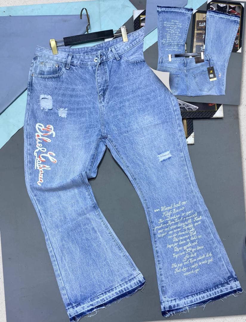 Bleach-Washed Wide-Leg Flare Jeans with Red Brand Script and White Typography Block