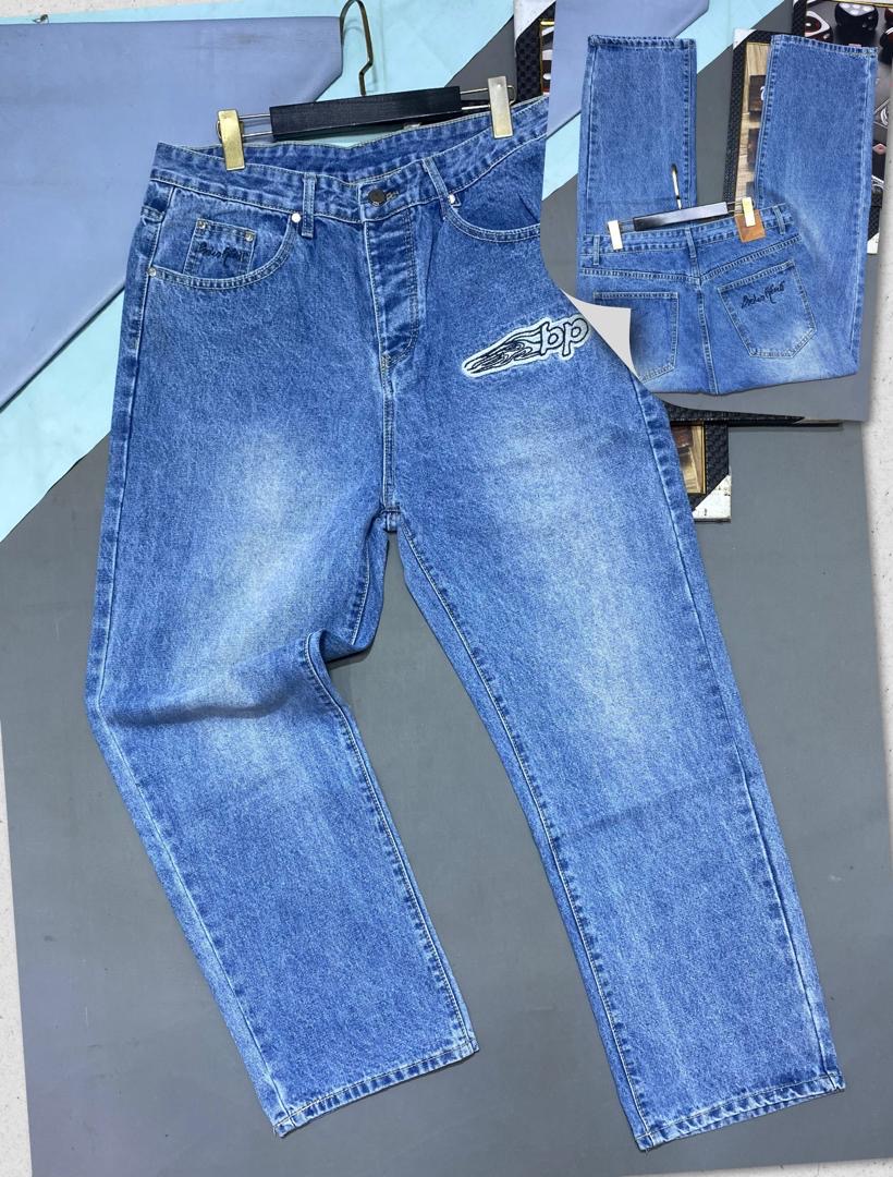 Vibrant Mid-Blue Relaxed-Fit Denim Jeans with Winged "bp" Graphic Patch