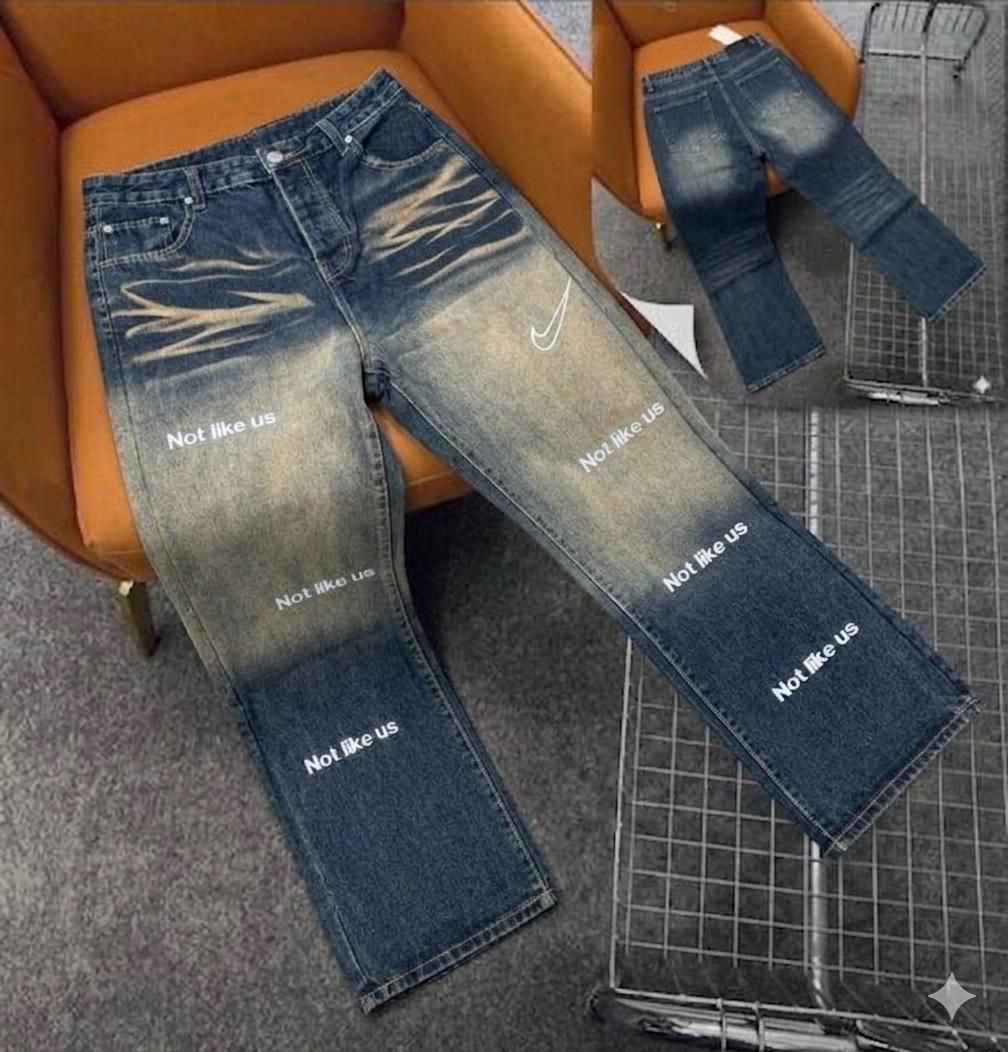Vintage Faded Indigo Jeans with White Athletic Swoosh and "Not like us" Graphic Typography