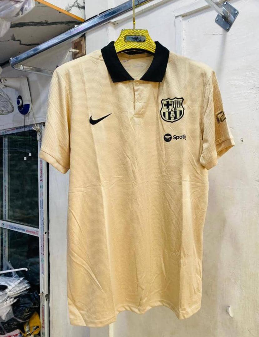 FC Barcelona Lifestyle Knit Polo Jersey with Sleek Spotify Branding – Sand Gold & Minimalist Black