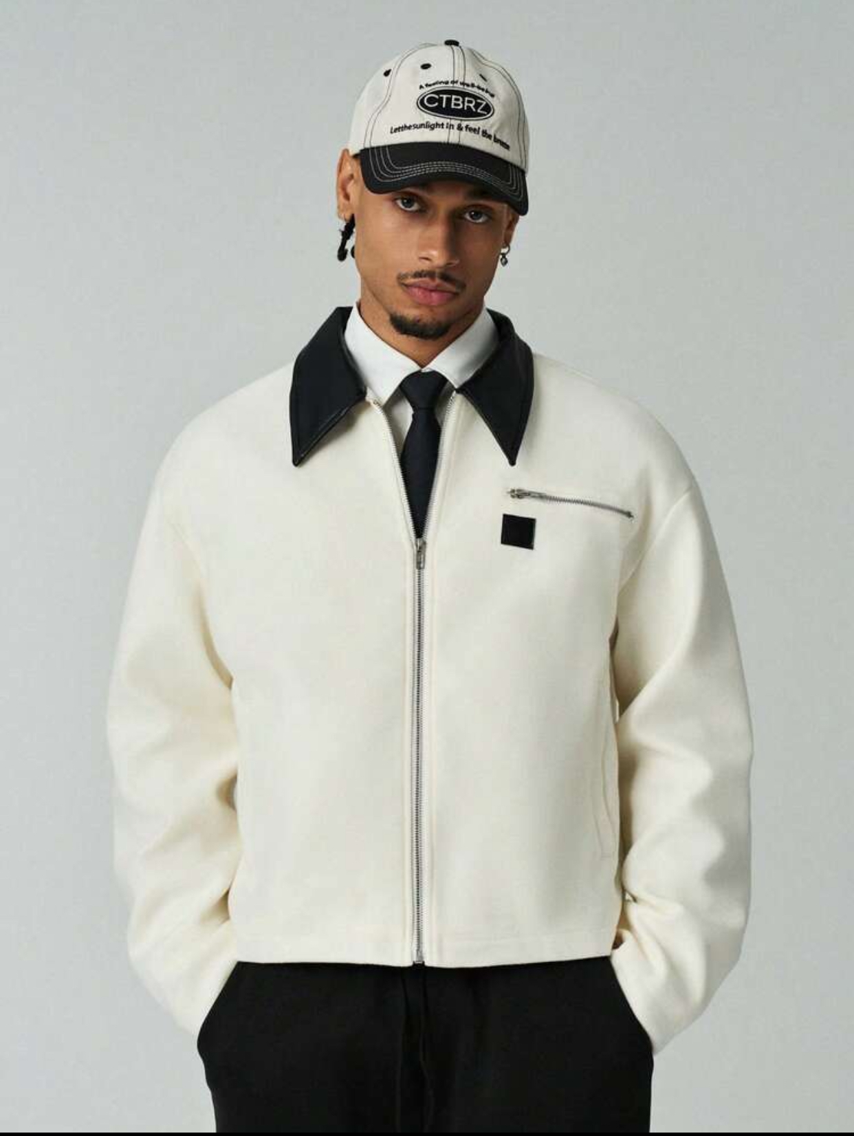 Sophisticated Neo-Classic Off-White Felted Wool-Blend Zip-Up Blouson Jacket Featuring a Contrast Black Faux-Leather Pointed Collar, Asymmetric Zippered Chest Pocket, and Minimalist Square Brand Accent Patch