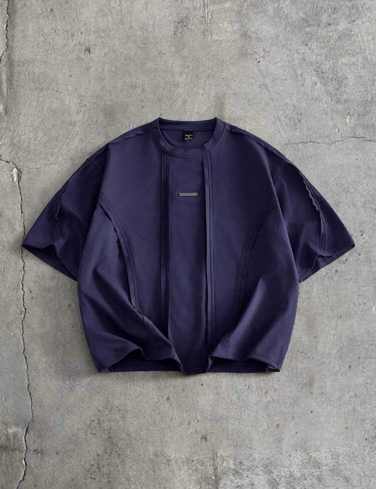 Contemporary Oversized Boxy Drop-Shoulder Espresso Dark Brown Heavyweight Cotton Streetwear T-Shirt Featuring Utilitarian Vertical Pintuck Seam Paneling and Minimalist Silver Metal Bar Chest Branding 2