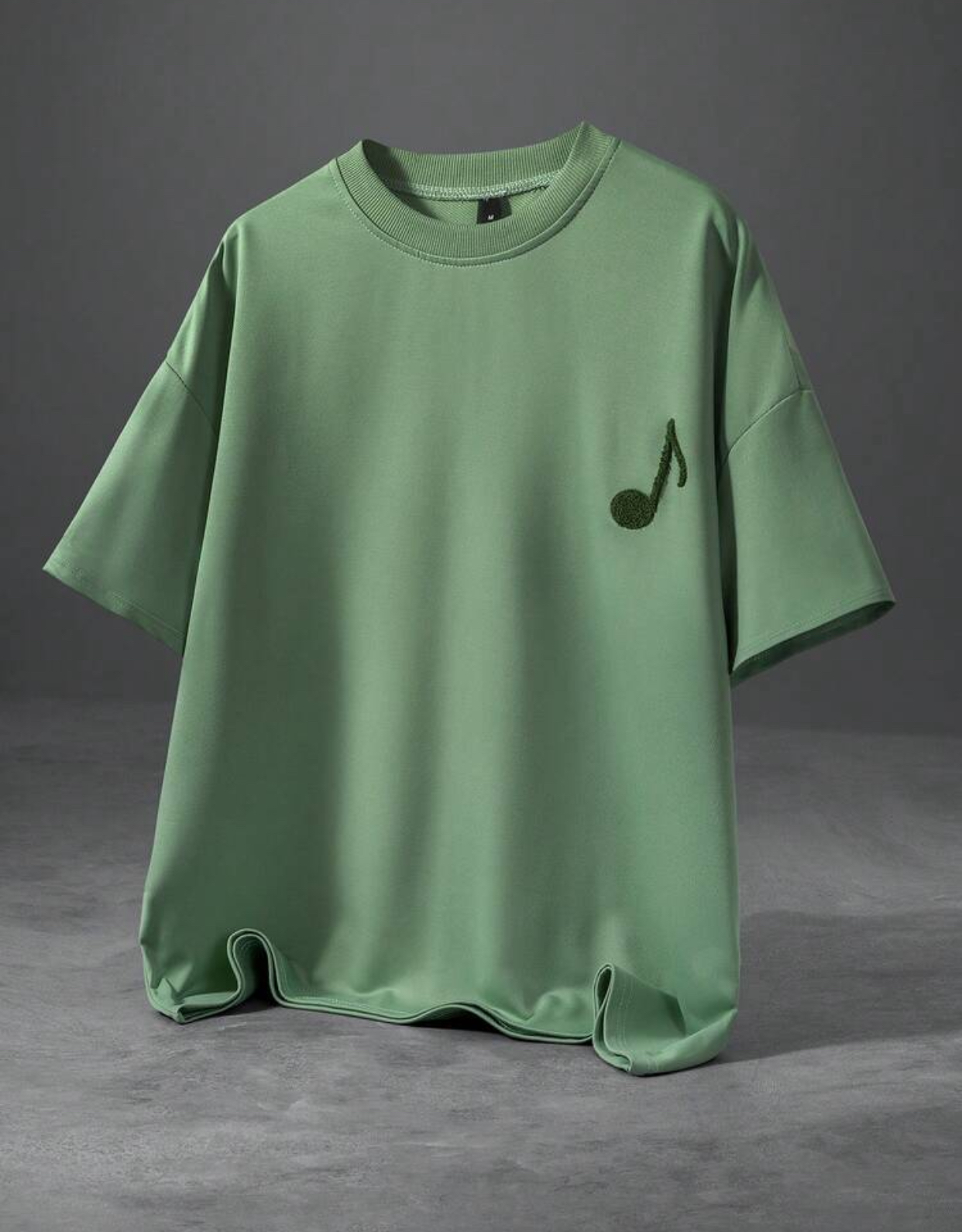 Premium Oversized Relaxed-Fit Sage Green Drop-Shoulder T-Shirt Crafted from Smooth Interlock Cotton Finished with a Textured Dark Olive Green Eighth Musical Note Chest Embroidery