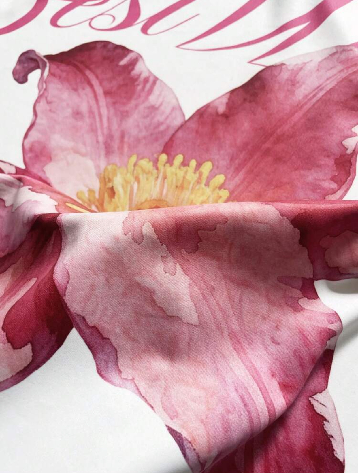 Minimalist Boxy Cropped Off-White Streetwear T-Shirt Embellished with a Vibrant Pink Lily Graphic and Layered "FLOWER" Sans-Serif Chest Typography 3