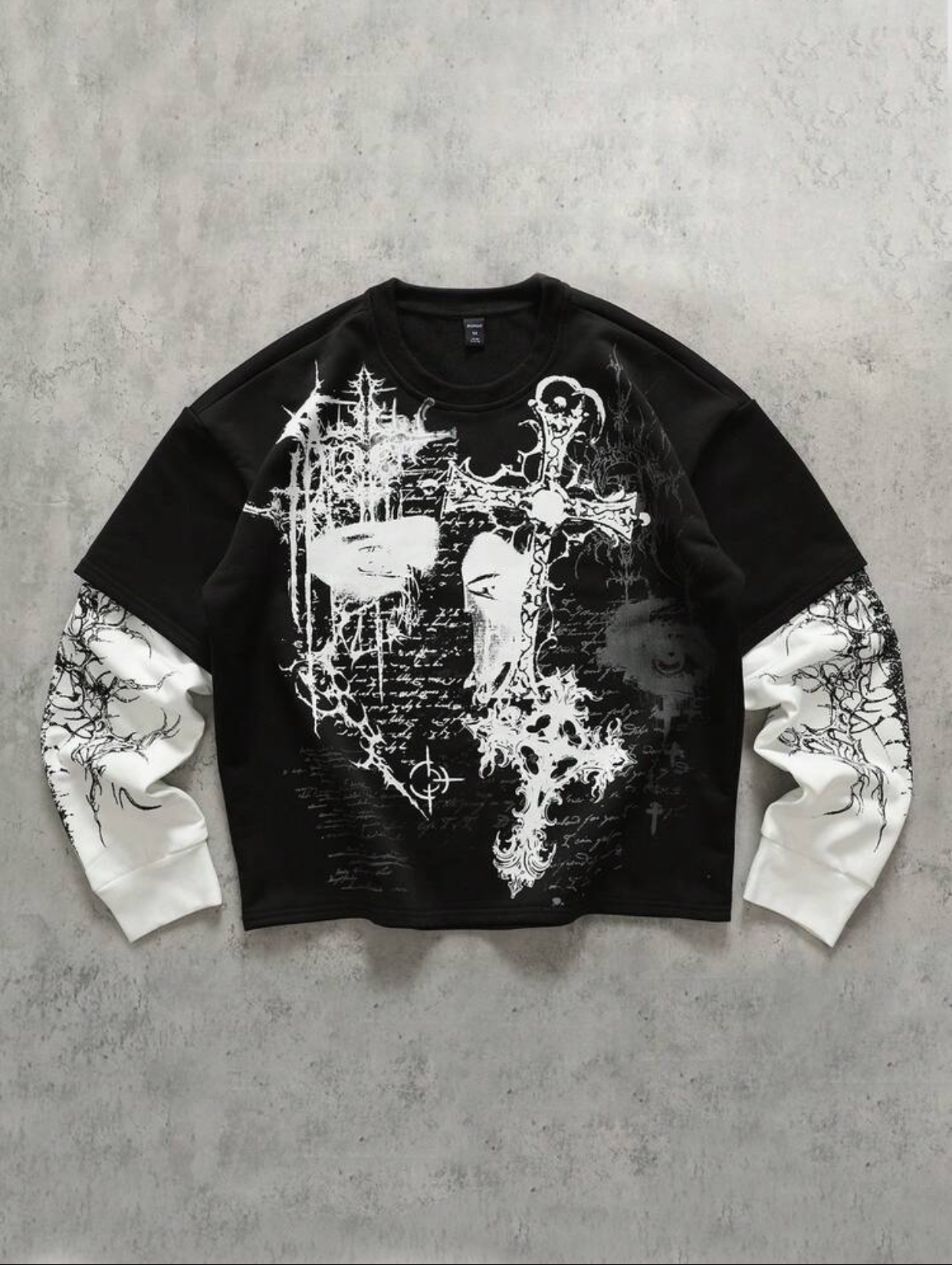 Gothic Grunge Faux-Two-Piece Black Crewneck Sweatshirt Featuring Stark White Contrast Layered Sleeves and a Complex Collage Chest Print of Neo-Tribal Thorns, Ornate Crosses, Abstract Faces, and Script Text 3