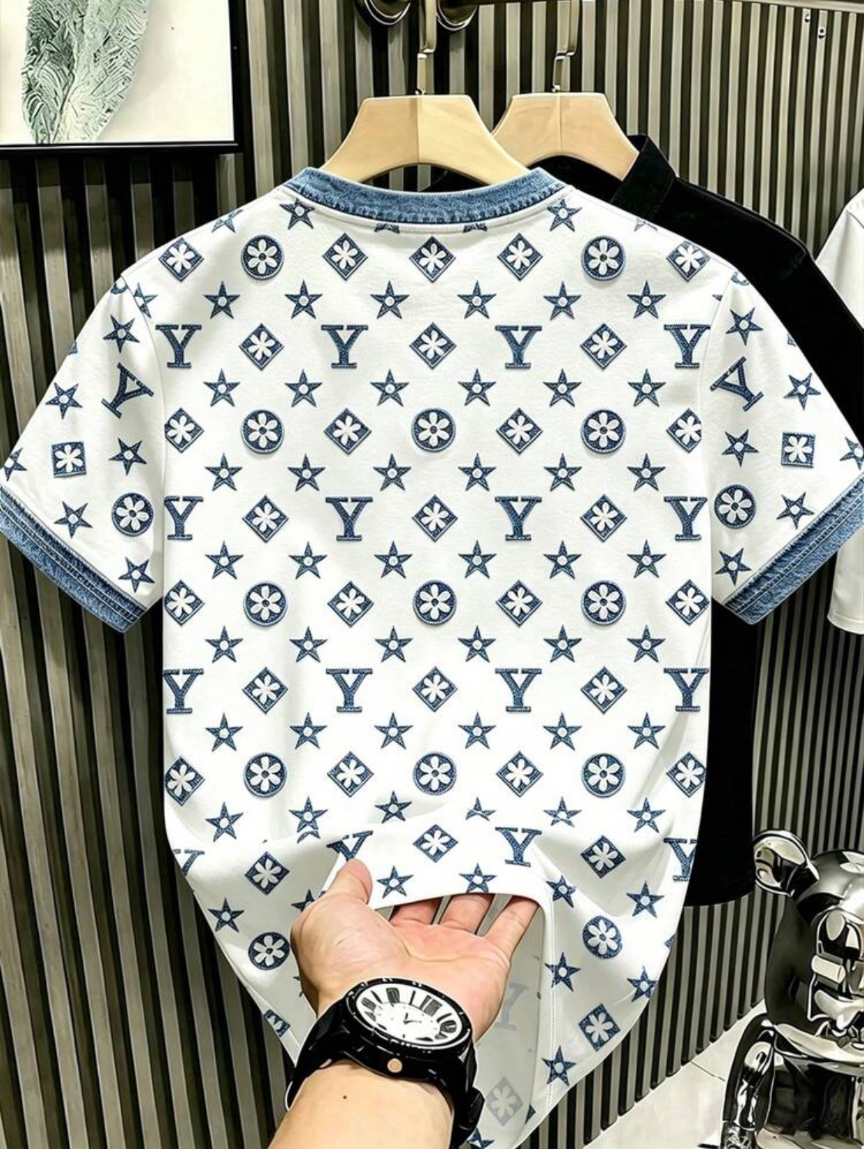 Luxury Streetwear White T-Shirt Featuring an All-Over Indigo Monogram Print of Geometric Florals, Stars, and Stylized "Y" Lettering Completed with Indigo Denim Ribbed Knit Collar and Cuff Trims 2