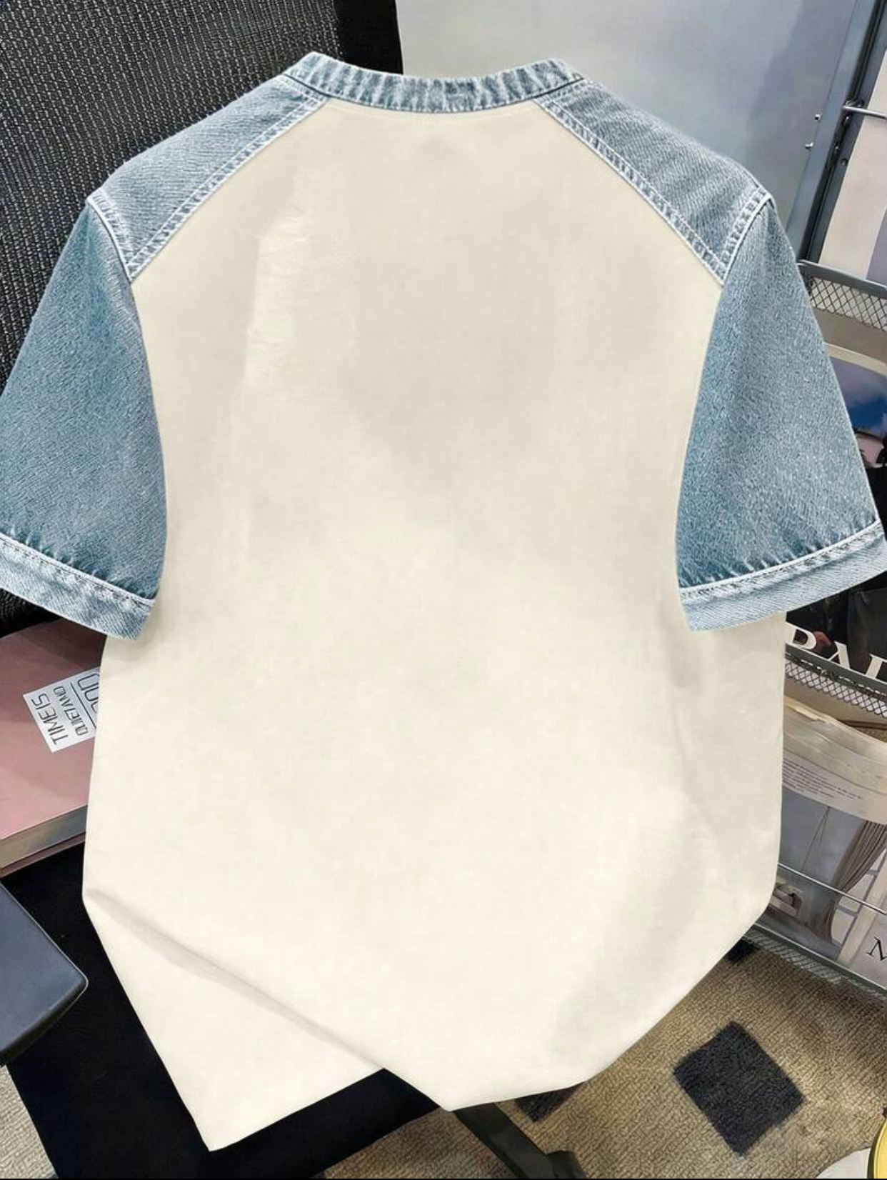 Contemporary Raglan-Style Off-White Streetwear T-Shirt Constructed with Light-Wash Denim Sleeves and an Exaggerated Centered Raw-Edge Frayed Denim "HK" Monogram Applique 2