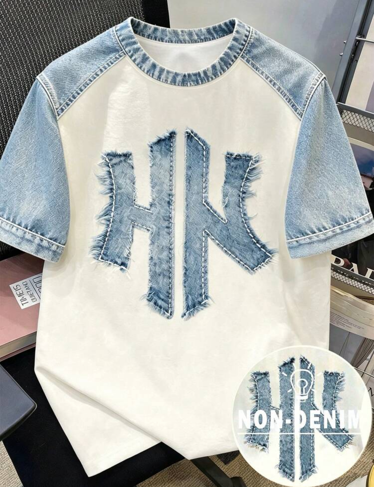 Contemporary Raglan-Style Off-White Streetwear T-Shirt Constructed with Light-Wash Denim Sleeves and an Exaggerated Centered Raw-Edge Frayed Denim "HK" Monogram Applique 3