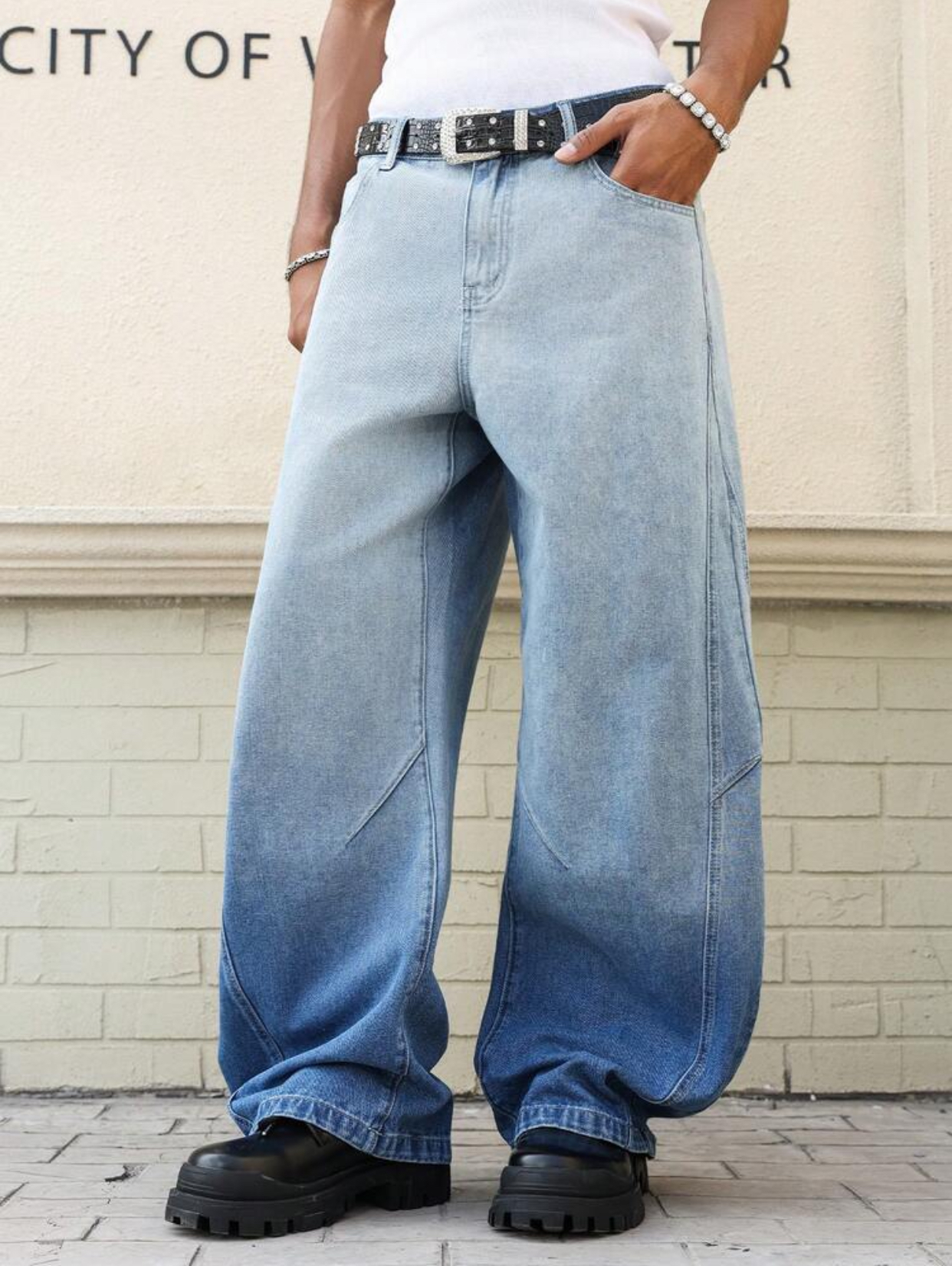 Industrial Grunge Acid-Washed Mineral Grey Wide-Leg Denim Jeans Featuring Faded Center-Leg Sandblasting, Splattered Paint Micro-Accents, and Raw Frayed Hems