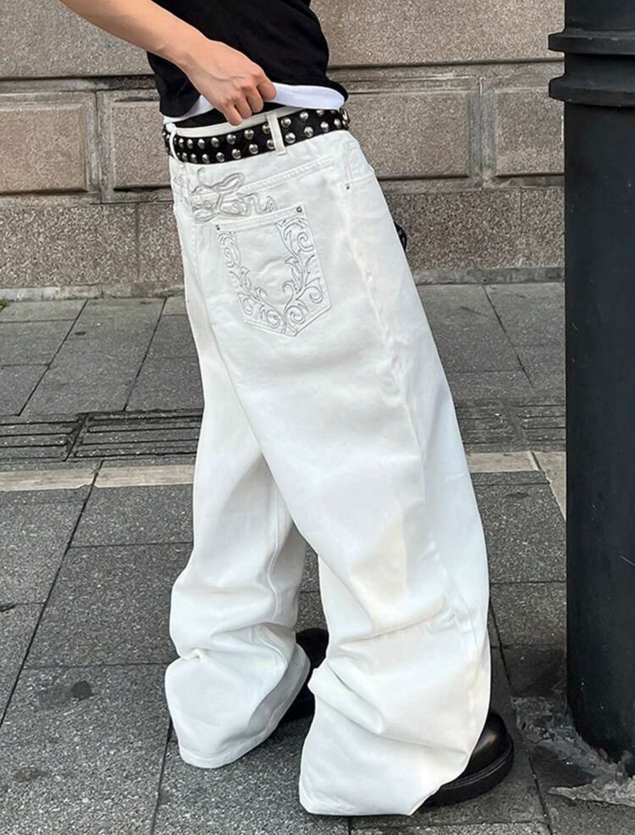 Y2K Harajuku-Inspired Ultra-Baggy Stark White Denim Jeans Featuring Intricate Baroque Silver-White Filigree Pocket Embroidery and a Double-Row Studded Leather Belt 2