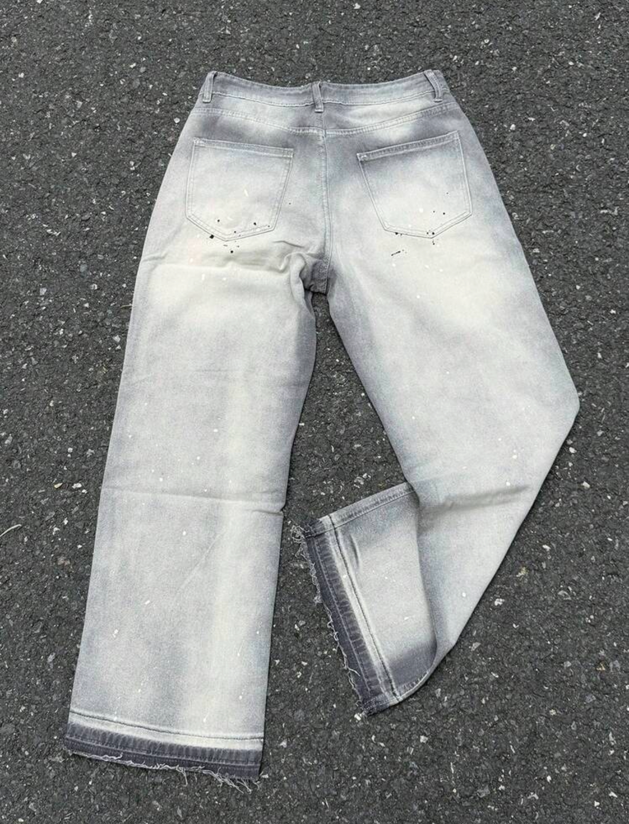 Industrial Grunge Acid-Washed Mineral Grey Wide-Leg Denim Jeans Featuring Faded Center-Leg Sandblasting, Splattered Paint Micro-Accents, and Raw Frayed Hems 2