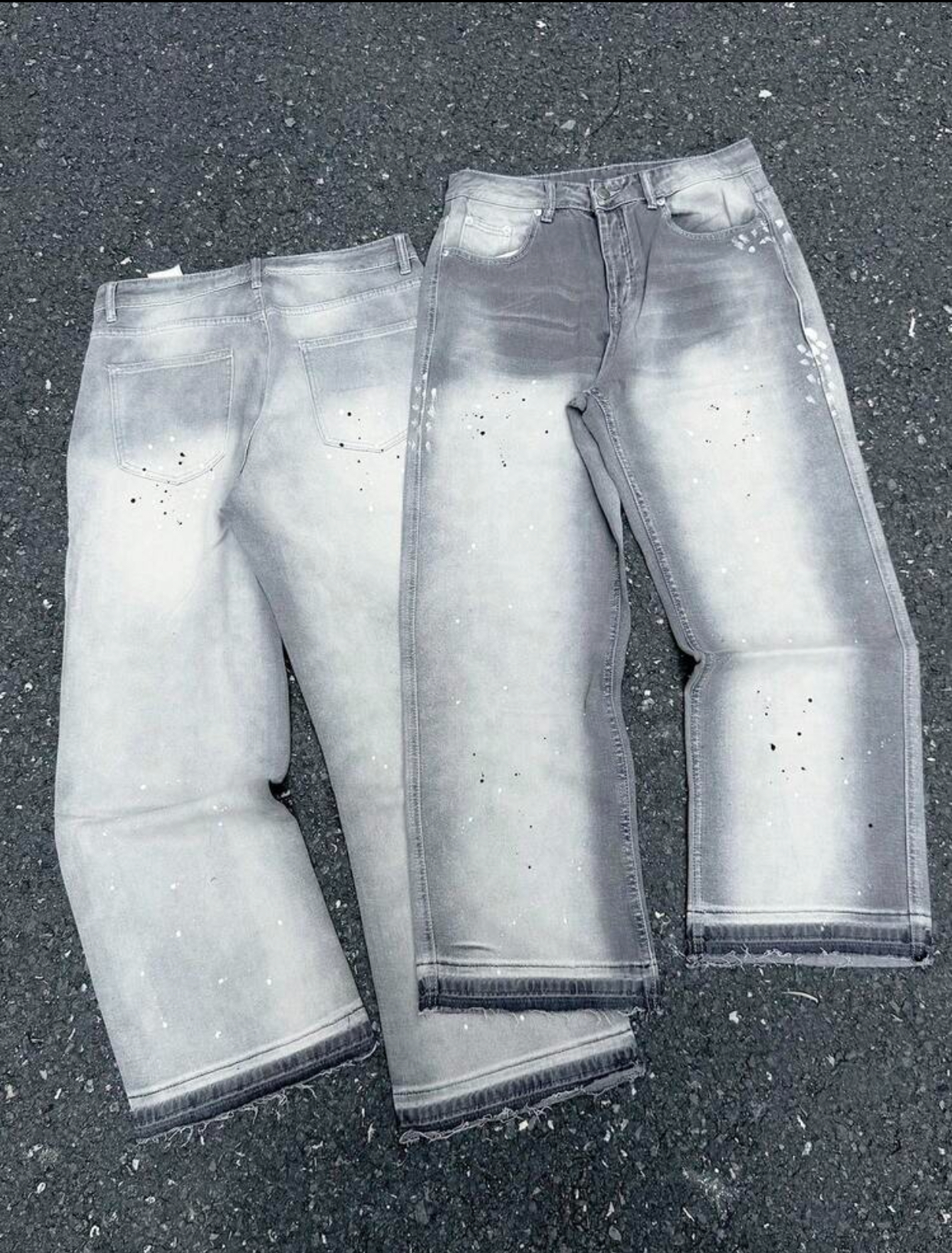 Industrial Grunge Acid-Washed Mineral Grey Wide-Leg Denim Jeans Featuring Faded Center-Leg Sandblasting, Splattered Paint Micro-Accents, and Raw Frayed Hems 3