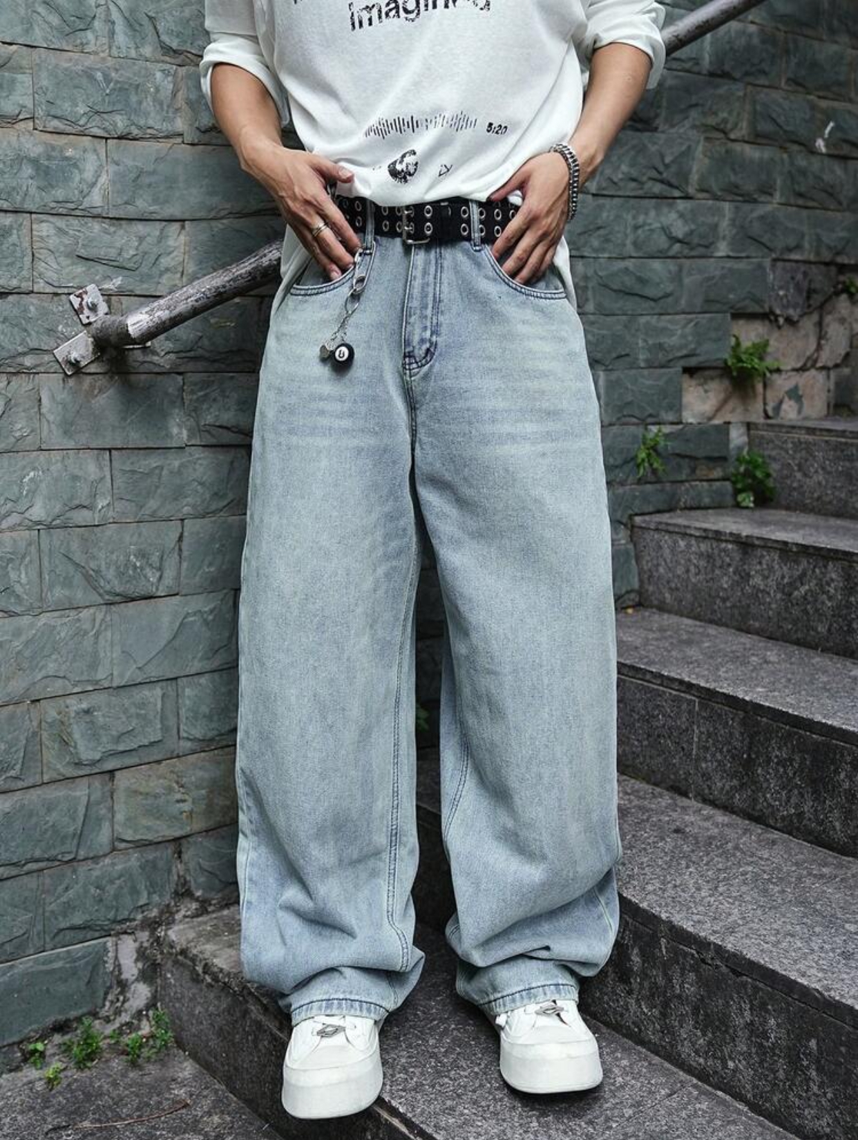 Classic Y2K Skater-Style Light Wash Bleached Ultra-Baggy Denim Jeans Featuring a Wide-Leg Puddle Fit and an 8-Ball Keychain Charm Accessory