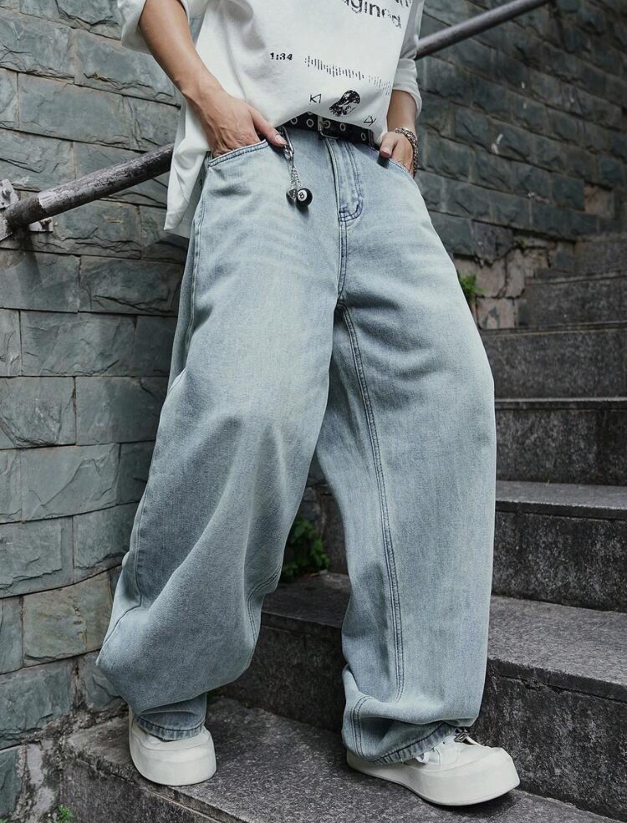Classic Y2K Skater-Style Light Wash Bleached Ultra-Baggy Denim Jeans Featuring a Wide-Leg Puddle Fit and an 8-Ball Keychain Charm Accessory 3