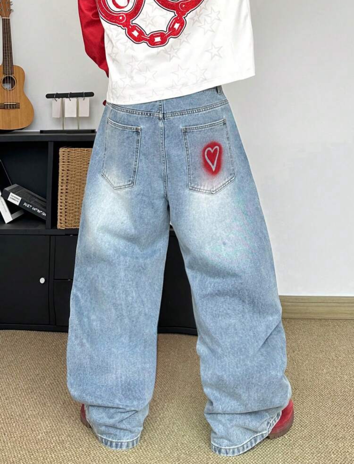 Playful Y2K-Core Bleached Blue Baggy Jeans Featuring an All-Over Red Lipstick Kiss Mark Graphic Print and an Airbrushed Neon Red Left-Knee Heart Motif 2