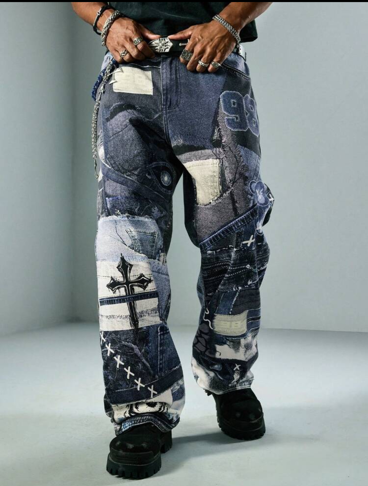 Y2K Gothic-Grunge Multi-Texture Trompe-L'œil Patchwork Baggy Jeans Featuring a Distressed Black Cross Graphic, Varsity Number 98 Applique, and Cross-Stitch Details