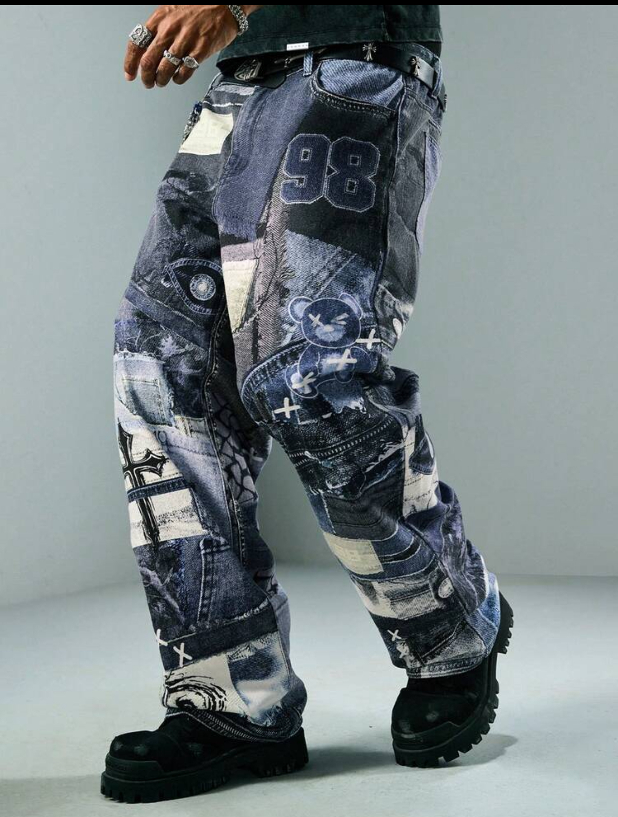Y2K Gothic-Grunge Multi-Texture Trompe-L'œil Patchwork Baggy Jeans Featuring a Distressed Black Cross Graphic, Varsity Number 98 Applique, and Cross-Stitch Details 2