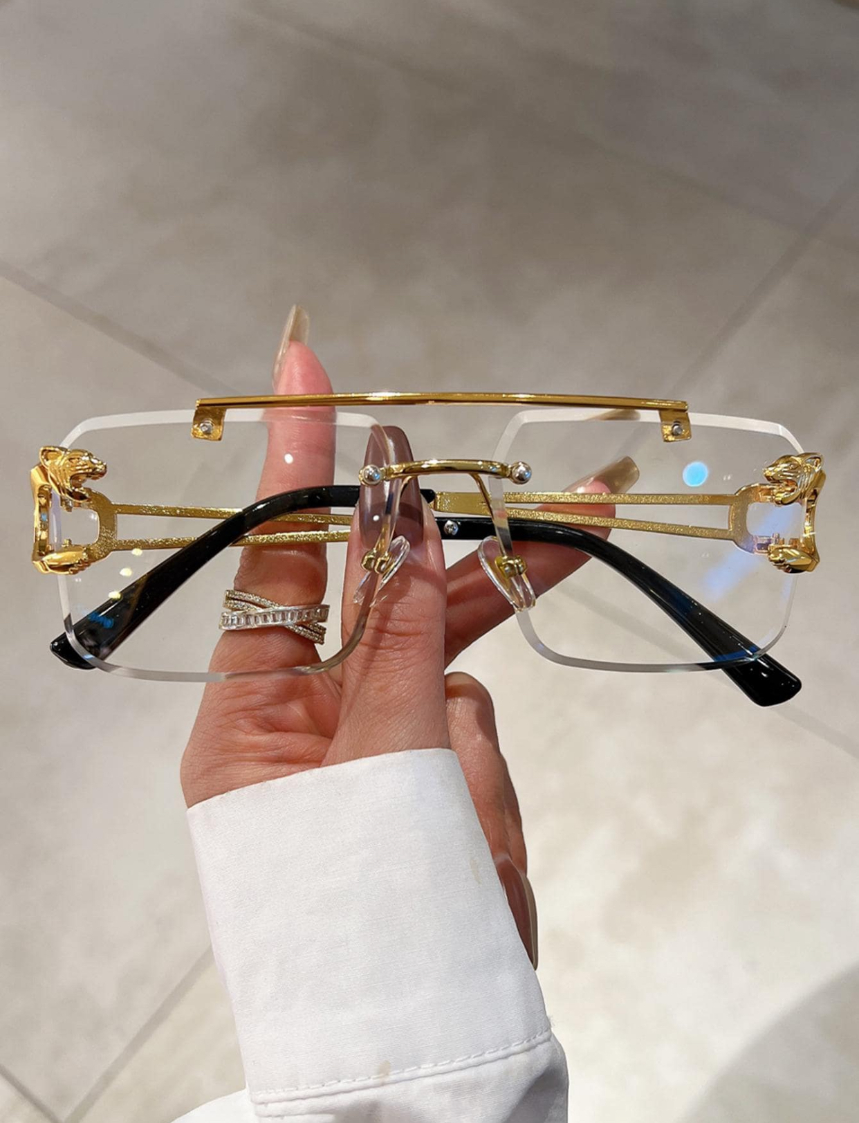 Statement Rimless Square Glasses with Sculpted Gold Panther Temples and Top Bar