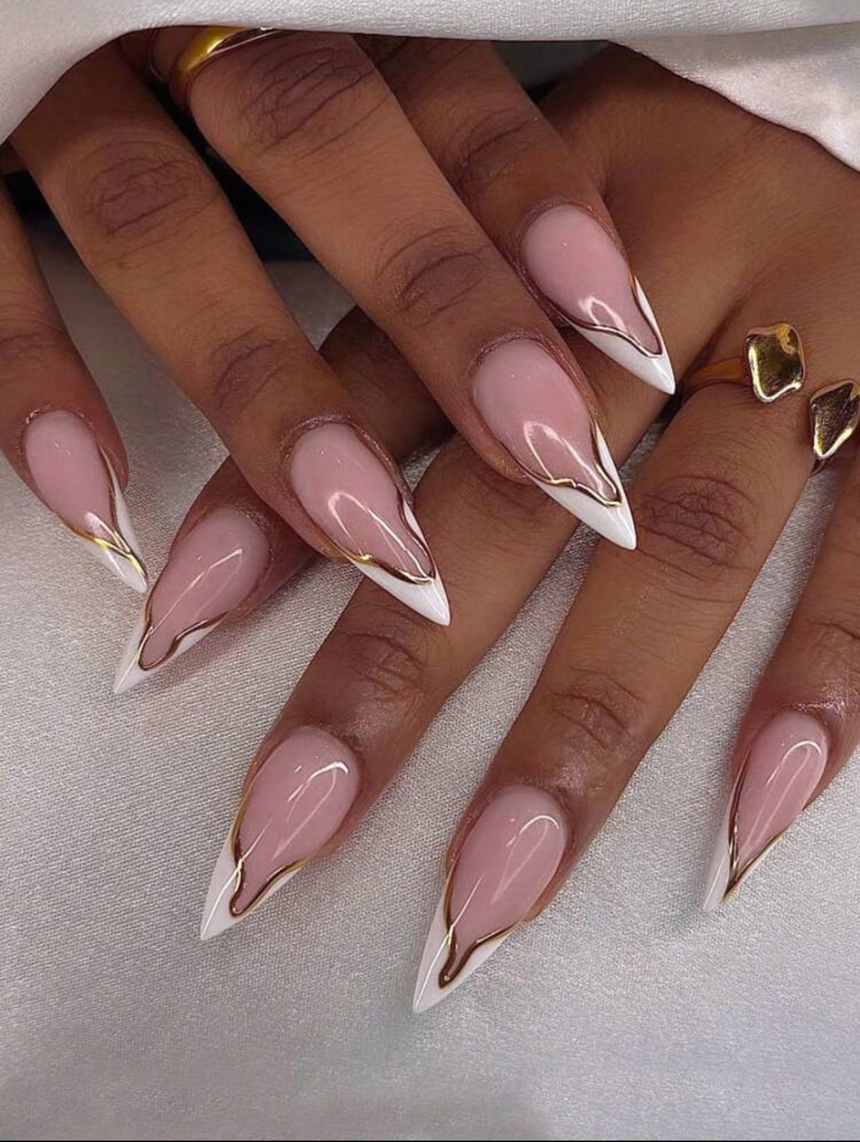 Celestial Modernist Long Stiletto Milky Nude Nails with Abstract Crisp White and Liquid Gold Ribbon Tips